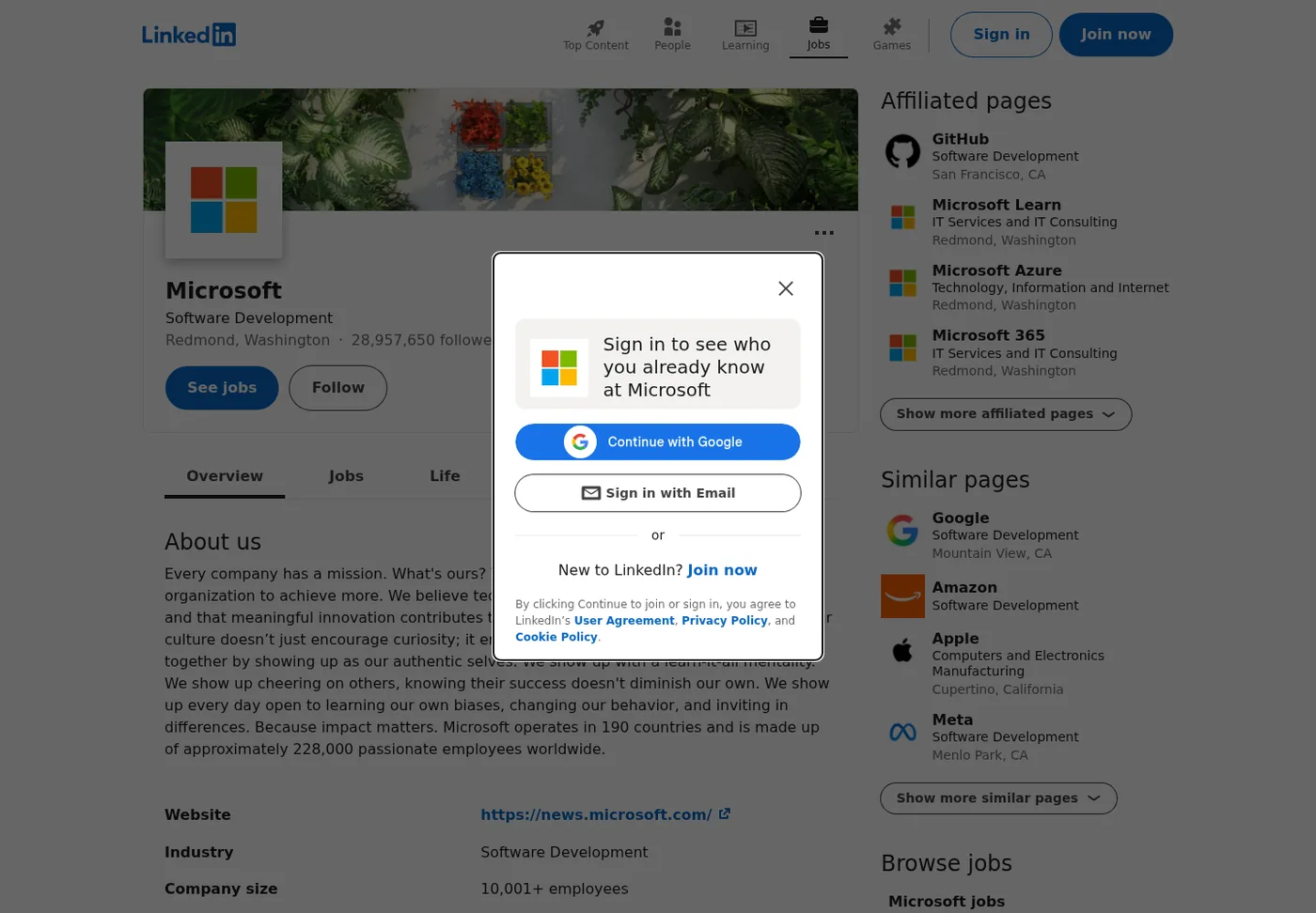 Public Microsoft LinkedIn company page with a sign-in modal. Software Development, Redmond, 28.9M followers, About, and news.microsoft.com stay visible.